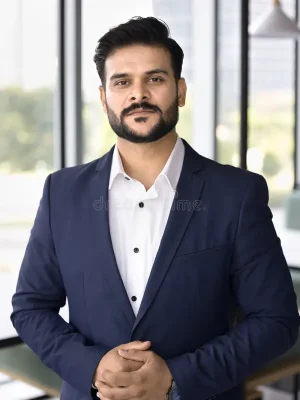 serious-indian-professional-business-man-office-portrait-serious-young-ambitious-indian-businessman-project-leader-dressed-367980912 Meet Our Leadership